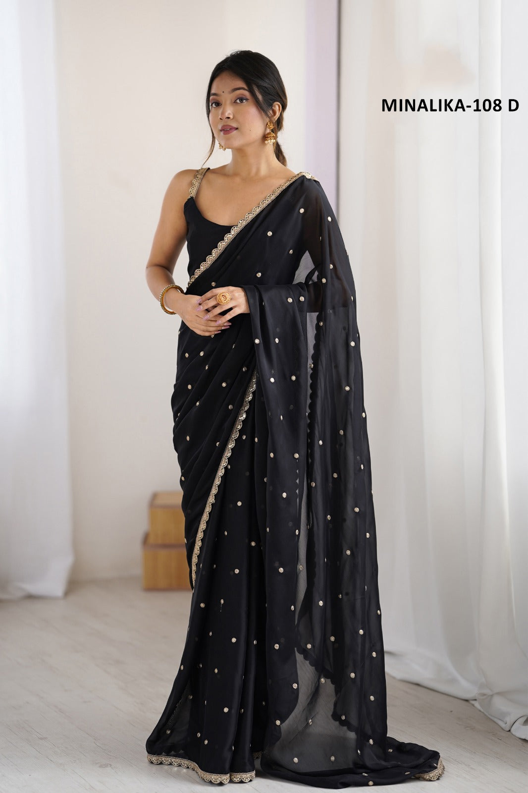 Classic Black Soft Silk Georgette Saree with Golden Butti Work and Lace Border by Krishna Textile Market
