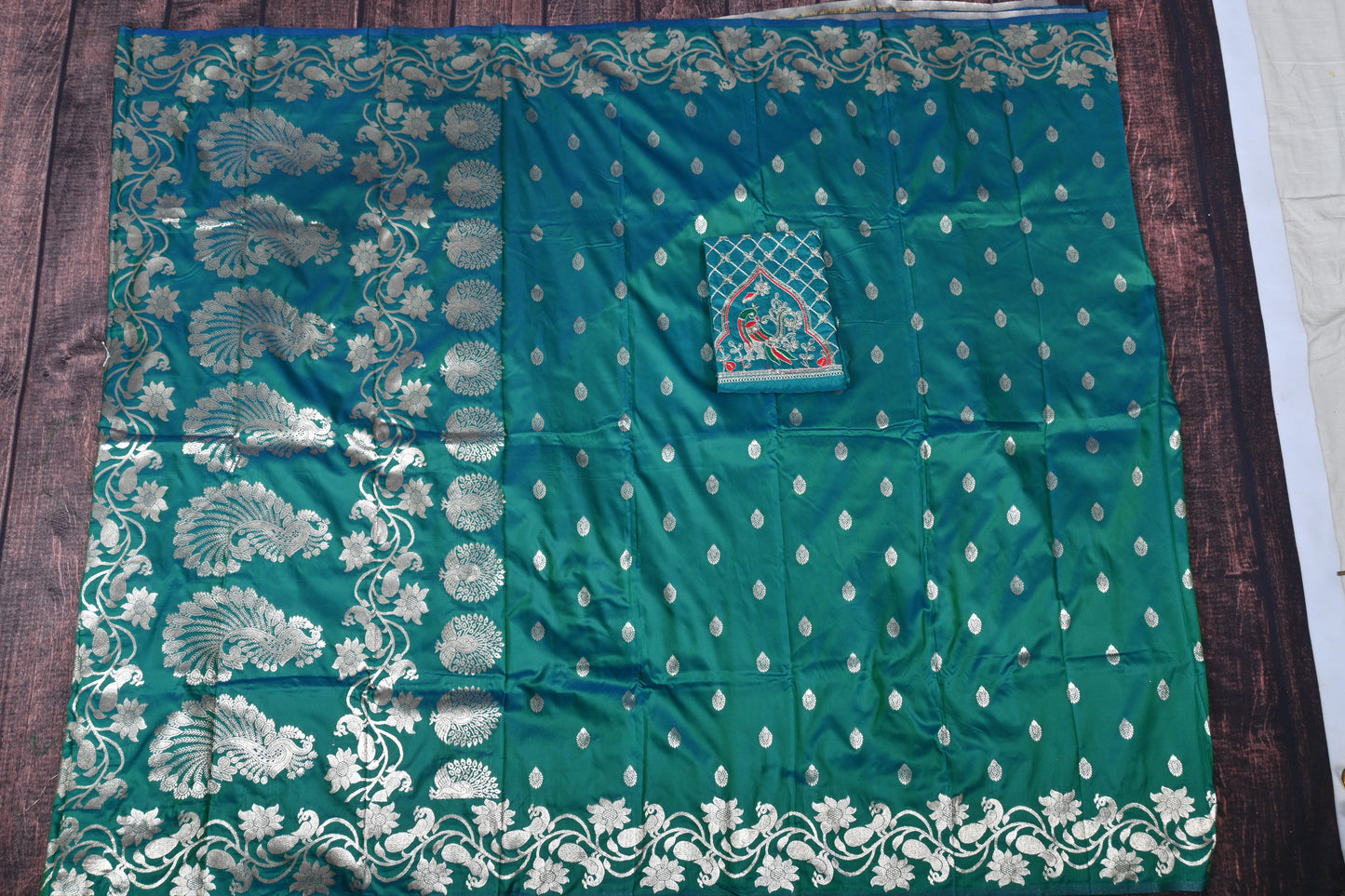Premium Soft Silk Kathpadar Saree with Royal Peacock Motif & Heavy Aari Work Blouse