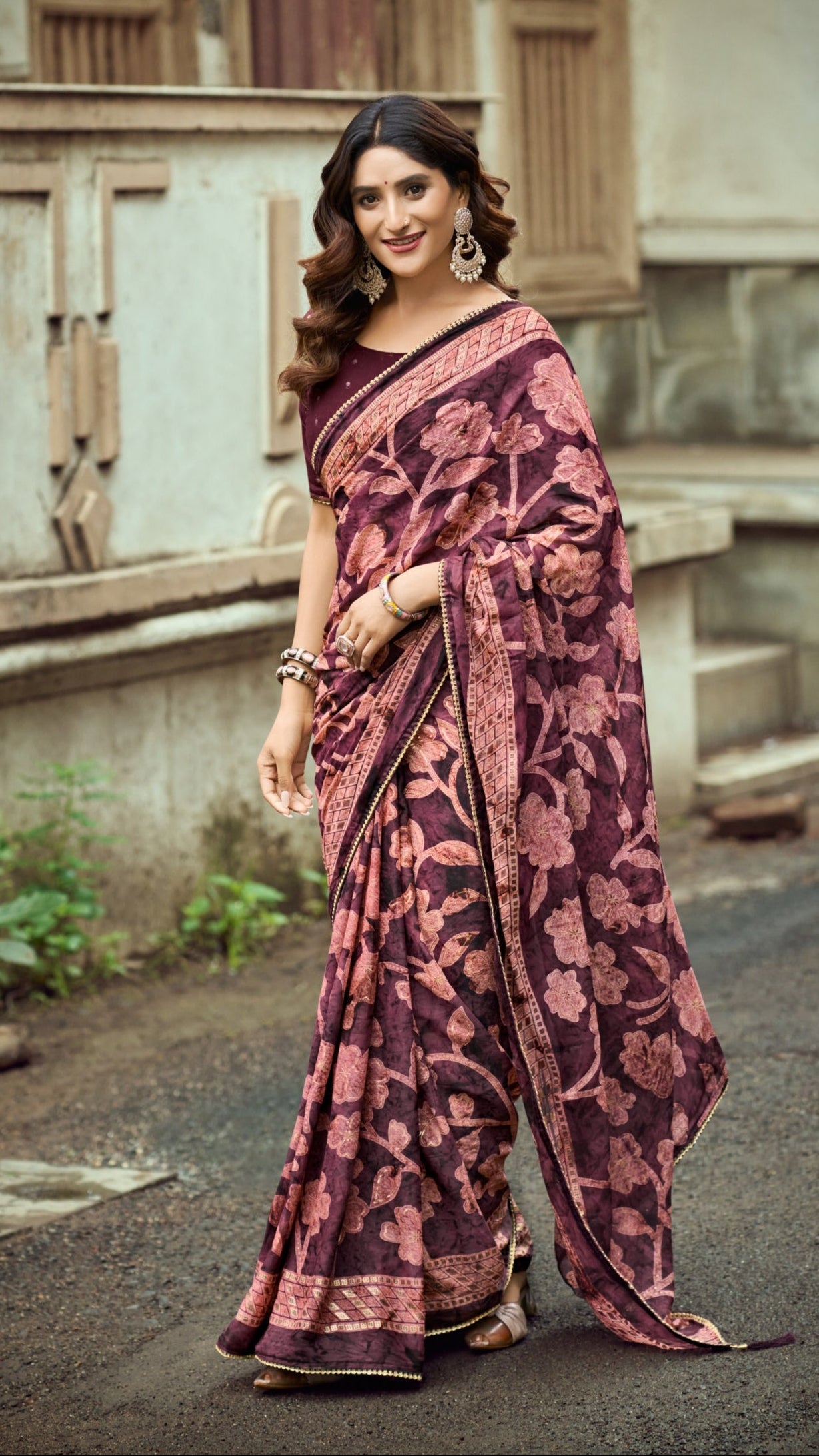 Wine purple Brasso Silk saree with foil floral print and designer zari border