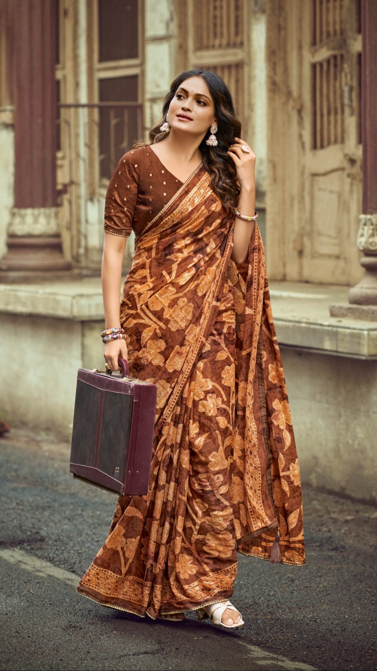 Copper brown Brasso Silk saree with floral foil print and designer border