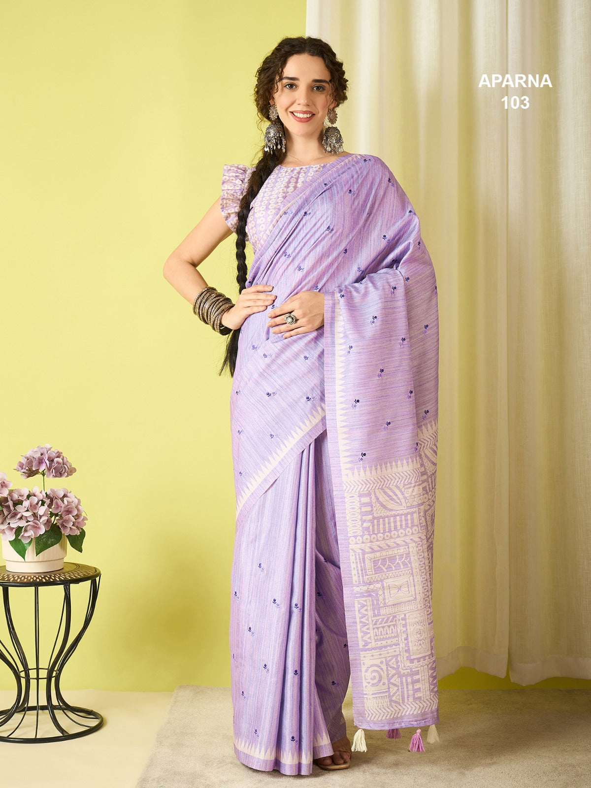 Lavender cotton blend saree with woven pallu, ethnic butti work and tassel detailing in soft comfortable lightweight fabric