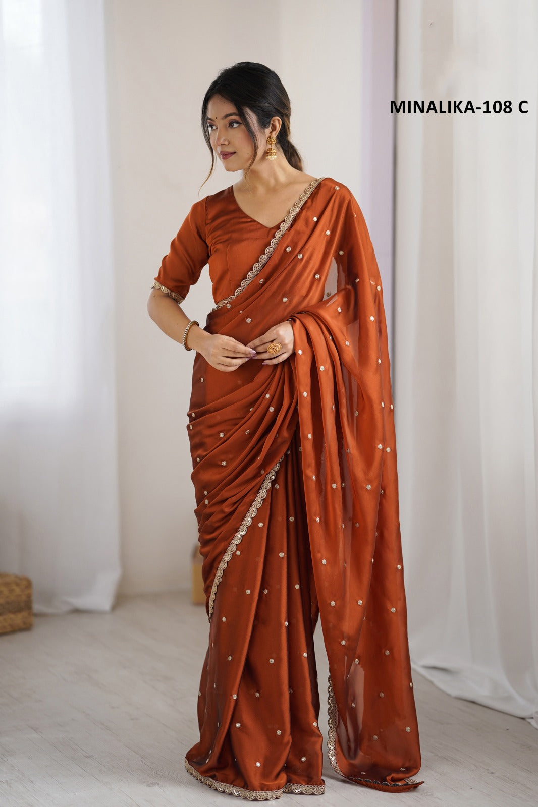 Rust Orange Soft Silk Georgette Saree with Golden Butti Work and Lace Border by Krishna Textile Market