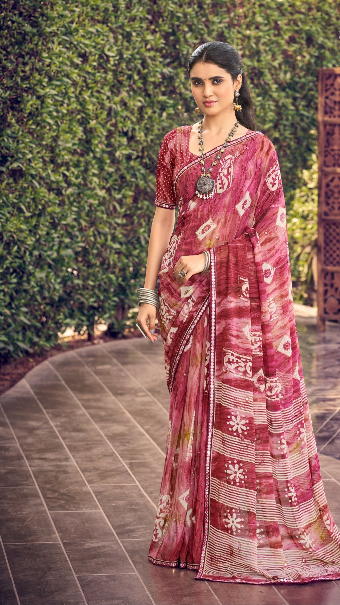 Rose pink traditional printed synthetic silk saree with foil mirror work border