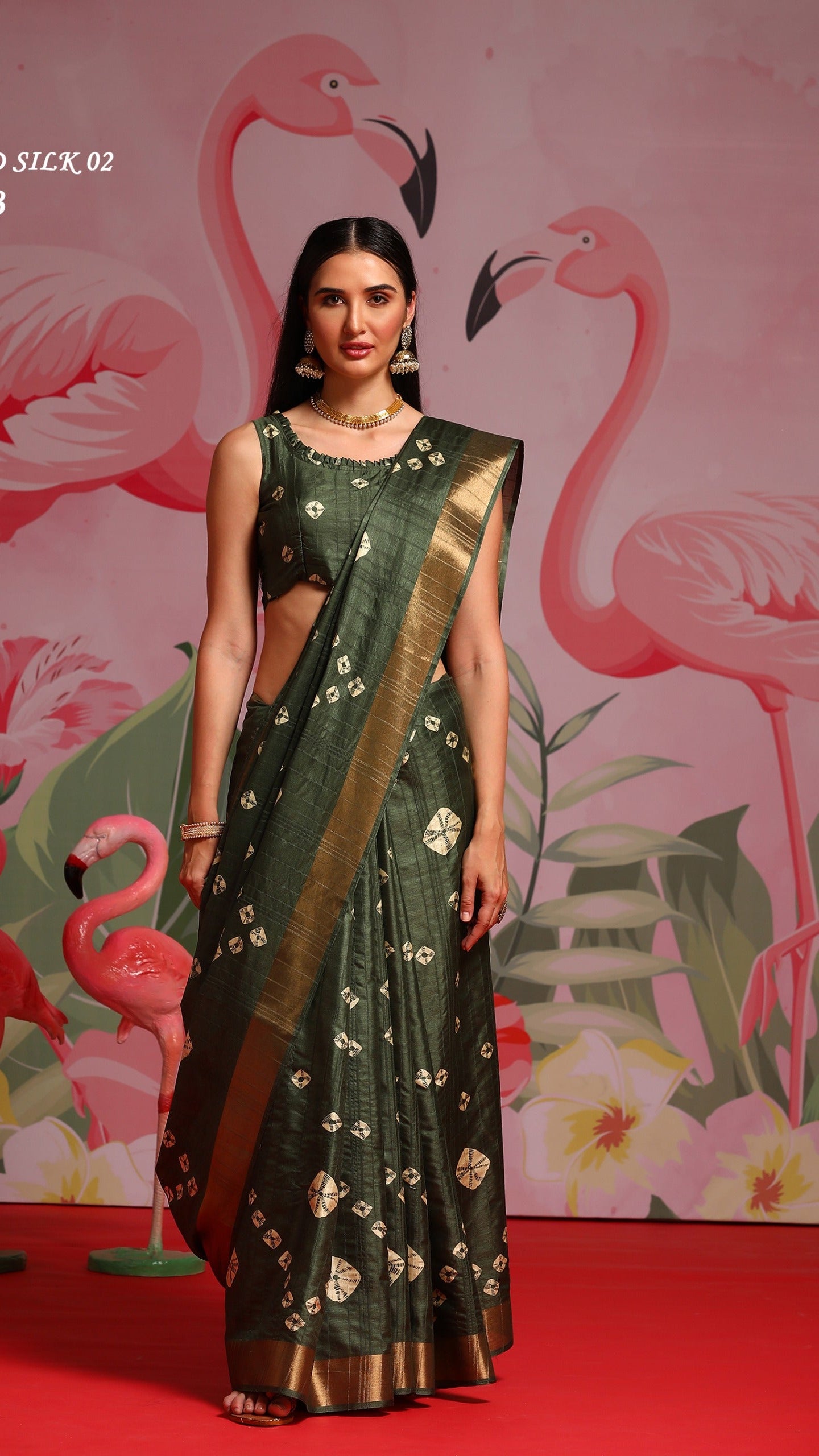 Olive green cotton silk saree featuring rich golden woven border and lightweight ethnic festive design for women